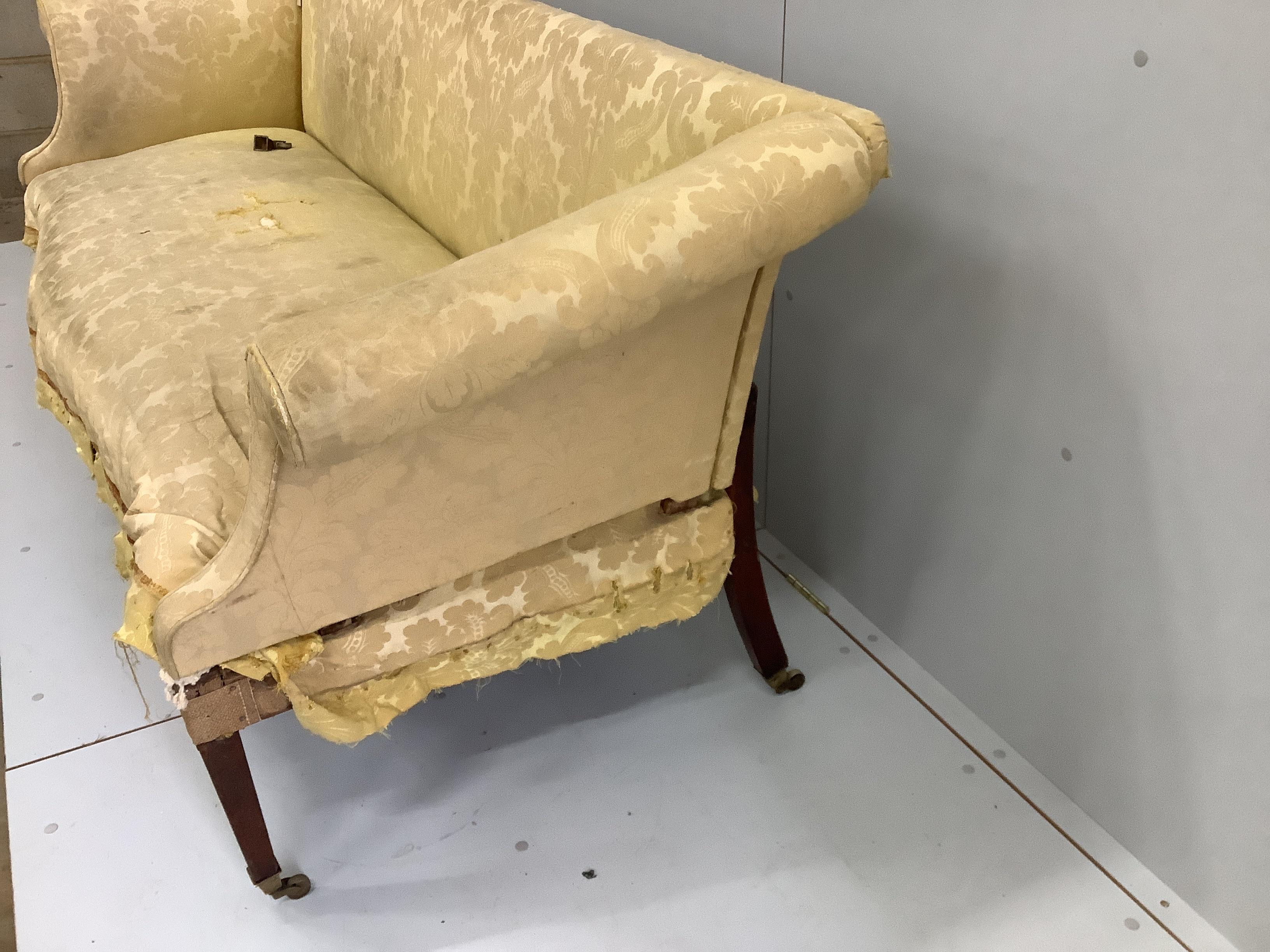 A George III sectional campaign settee on square tapered mahogany legs width 220cm, depth 76cm, height 84cm.